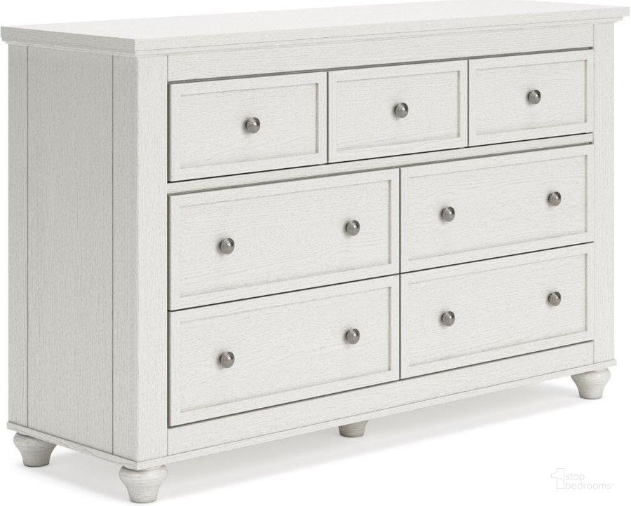The appearance of Corgan White Dresser designed by Windsor Home in the traditional interior design. This white piece of furniture  was selected by 1StopBedrooms from Corgan Collection to add a touch of cosiness and style into your home. Sku: B3290-231. Material: Wood. Product Type: Dresser. Image1