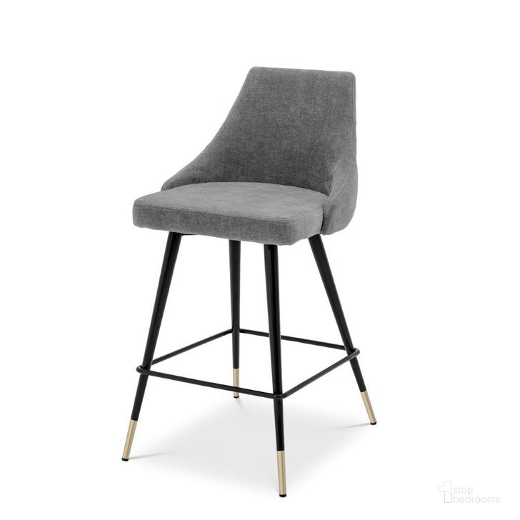The appearance of Counter Stool In Cedro Clarck Grey designed by Eichholtz in the modern / contemporary interior design. This grey piece of furniture  was selected by 1StopBedrooms from Cedro Collection to add a touch of cosiness and style into your home. Sku: A112059. Product Type: Barstool. Material: Brass. Image1