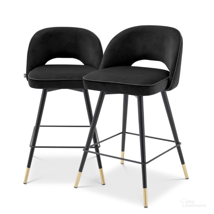 The appearance of Counter Stool In Cliff Roche Black Velvet Set Of 2 designed by Eichholtz in the modern / contemporary interior design. This black piece of furniture  was selected by 1StopBedrooms from Cliff Collection to add a touch of cosiness and style into your home. Sku: A114575. Material: Leather. Product Type: Barstool. Image1