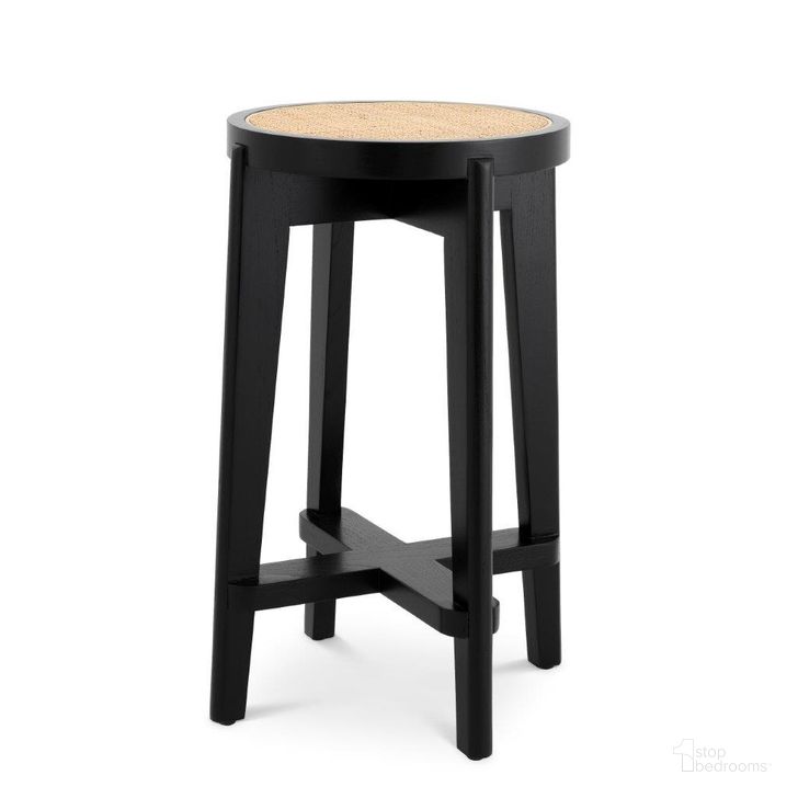 The appearance of Counter Stool In Dareau Classic Black designed by Eichholtz in the modern / contemporary interior design. This black piece of furniture  was selected by 1StopBedrooms from Dareau Collection to add a touch of cosiness and style into your home. Sku: 114382. Material: Rattan. Product Type: Barstool. Image1