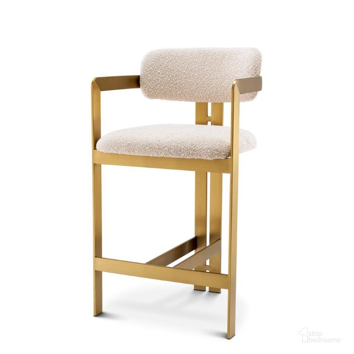 The appearance of Counter Stool In Donato Brushed Brass Finish Boucle Cream designed by Eichholtz in the modern / contemporary interior design. This brass piece of furniture  was selected by 1StopBedrooms from Donato Collection to add a touch of cosiness and style into your home. Sku: A115049. Material: Fabric. Product Type: Barstool. Image1