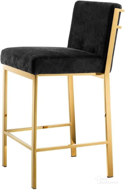 The appearance of Counter Stool In Scott Gold Finish Black Velvet designed by Eichholtz in the modern / contemporary interior design. This gold piece of furniture  was selected by 1StopBedrooms from Scott Collection to add a touch of cosiness and style into your home. Sku: A111418. Product Type: Barstool. Material: Velvet. Image1