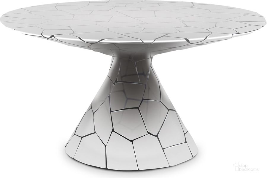 The appearance of Crazy Cut Dining Table designed by Phillips Collection in the modern / contemporary interior design. This silver piece of furniture  was selected by 1StopBedrooms from Crazy Cut Collection to add a touch of cosiness and style into your home. Sku: PH64769. Table Base Style: Pedestal. Table Top Shape: Round. Product Type: Dining Table. Material: Stainless Steel. Size: 56". Image1