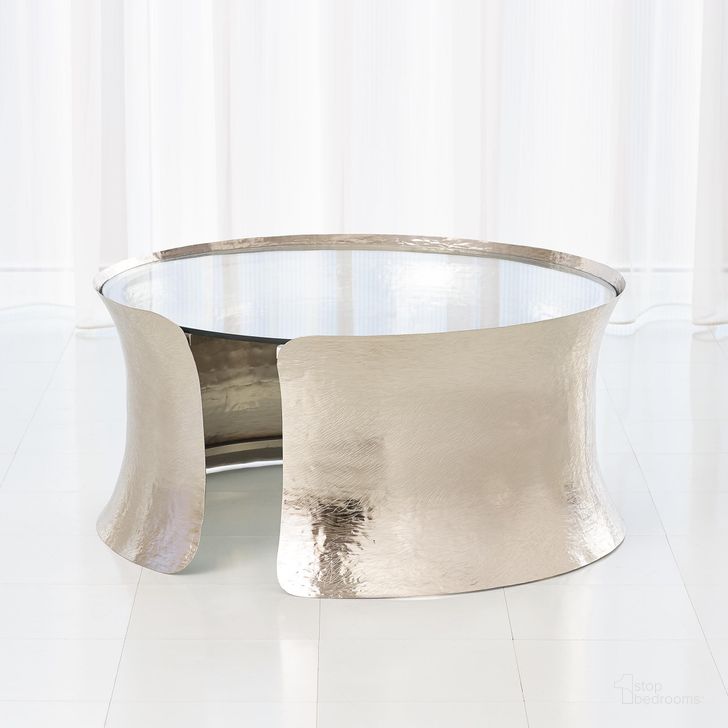 The appearance of Cuff Cocktail Table In Silver designed by Global Views in the modern / contemporary interior design. This silver piece of furniture  was selected by 1StopBedrooms from Cuff Collection to add a touch of cosiness and style into your home. Sku: 9.9225. Material: Aluminum. Product Type: Cocktail Table. Image1