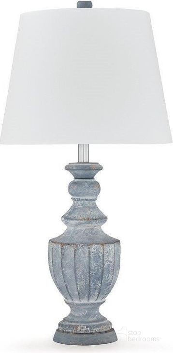 The appearance of Cylerick Table Lamp In Antique Blue designed by Signature Design by Ashley in the traditional interior design. This antique blue piece of furniture  was selected by 1StopBedrooms from Cylerick Collection to add a touch of cosiness and style into your home. Sku: L235714. Material: Wood. Product Type: Table Lamp. Image1