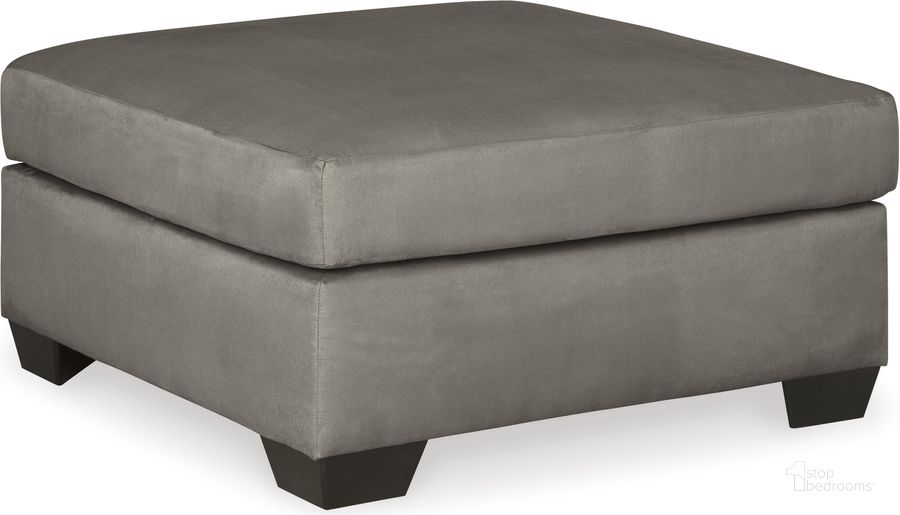 The appearance of Darcy Ottoman In Cobblestone designed by Signature Design by Ashley in the modern / contemporary interior design. This cobblestone piece of furniture  was selected by 1StopBedrooms from Darcy Collection to add a touch of cosiness and style into your home. Sku: 7500514. Material: Fabric. Product Type: Ottoman. Image1