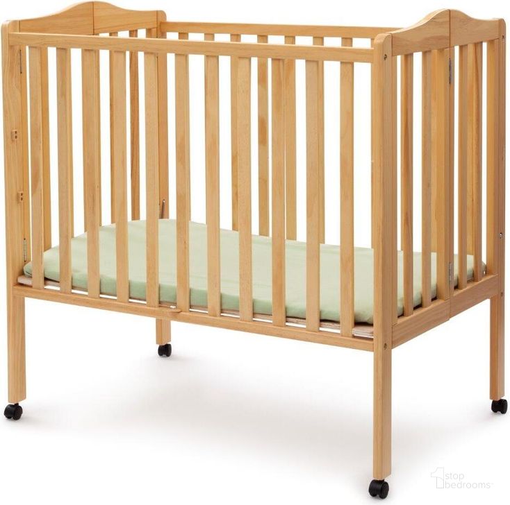 The appearance of Delta Children Folding Portable Mini Baby Crib With 1.5 Inch Mattress With Greenguard Gold Certified In Natural designed by Delta Children in the modern / contemporary interior design. This natural piece of furniture  was selected by 1StopBedrooms from  to add a touch of cosiness and style into your home. Sku: 4472-260. Material: Wood. Product Type: Crib. Image1