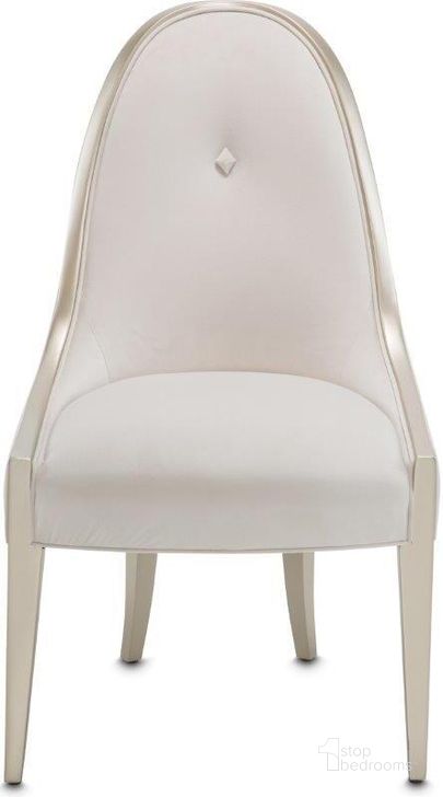 The appearance of Dene Metis Creamy Pearl Side Chair designed by Bennett Interiors in the transitional interior design. This creamy pearl piece of furniture  was selected by 1StopBedrooms from Dene Metis Collection to add a touch of cosiness and style into your home. Sku: N9004003A-112. Material: Polyester. Product Type: Side Chair. Image1