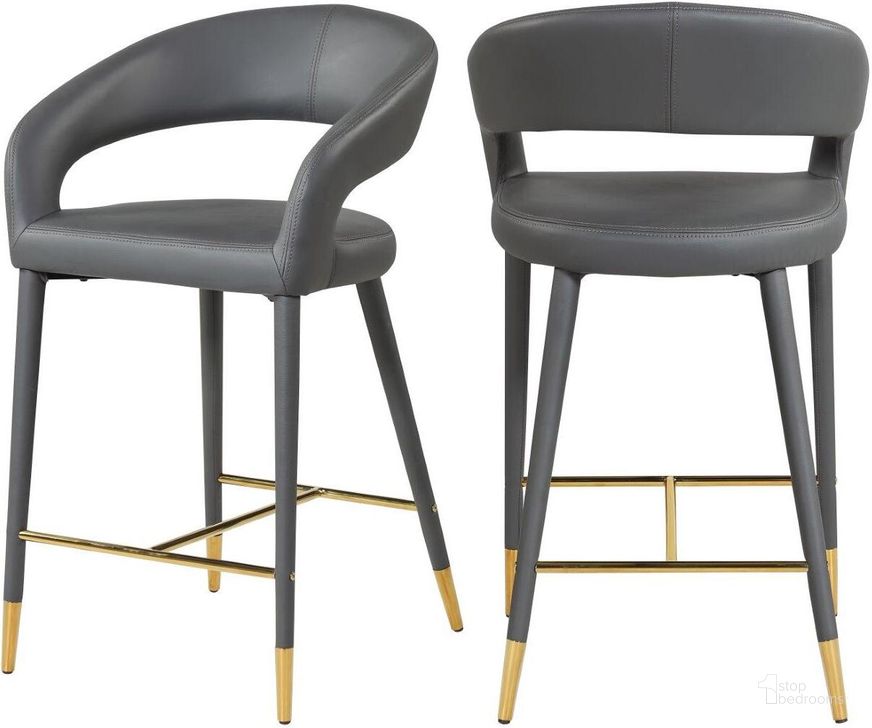 The appearance of Destiny Grey Faux Leather Stool designed by Meridian in the modern / contemporary interior design. This grey faux leather piece of furniture  was selected by 1StopBedrooms from Destiny Collection to add a touch of cosiness and style into your home. Sku: 541Grey-C. Material: Metal. Product Type: Counter Height Chair. Image1