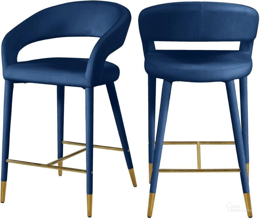 The appearance of Destiny Navy Velvet Stool designed by Meridian in the modern / contemporary interior design. This navy velvet piece of furniture  was selected by 1StopBedrooms from Destiny Collection to add a touch of cosiness and style into your home. Sku: 540Navy-C. Material: Metal. Product Type: Counter Height Chair. Image1