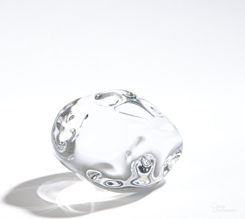 The appearance of Dimple Small Paperweight In Clear designed by Global Views in the modern / contemporary interior design. This clear piece of furniture  was selected by 1StopBedrooms from Dimple Collection to add a touch of cosiness and style into your home. Sku: 6.60544. Material: Glass. Product Type: Decorative Accessory. Image1