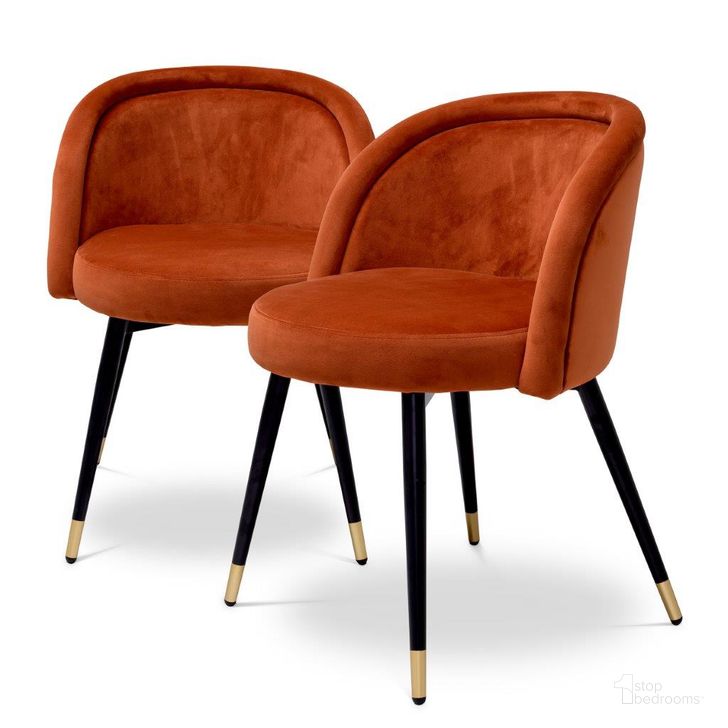 The appearance of Dining Chair Chloe Savona Orange Velvet Set Of 2 designed by Eichholtz in the modern / contemporary interior design. This orange piece of furniture  was selected by 1StopBedrooms from Chloe Collection to add a touch of cosiness and style into your home. Sku: A115964. Product Type: Dining Chair. Material: Velvet. Image1