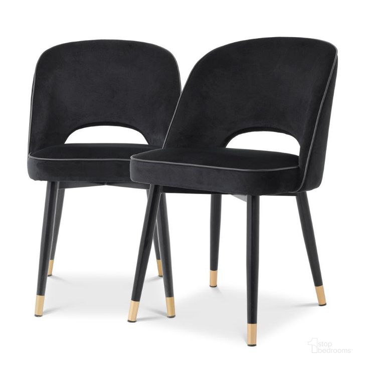 The appearance of Dining Chair Cliff Roche Black Velvet Set Of 2 designed by Eichholtz in the modern / contemporary interior design. This black piece of furniture  was selected by 1StopBedrooms from Cliff Collection to add a touch of cosiness and style into your home. Sku: A114401. Material: Leather. Product Type: Dining Chair. Image1