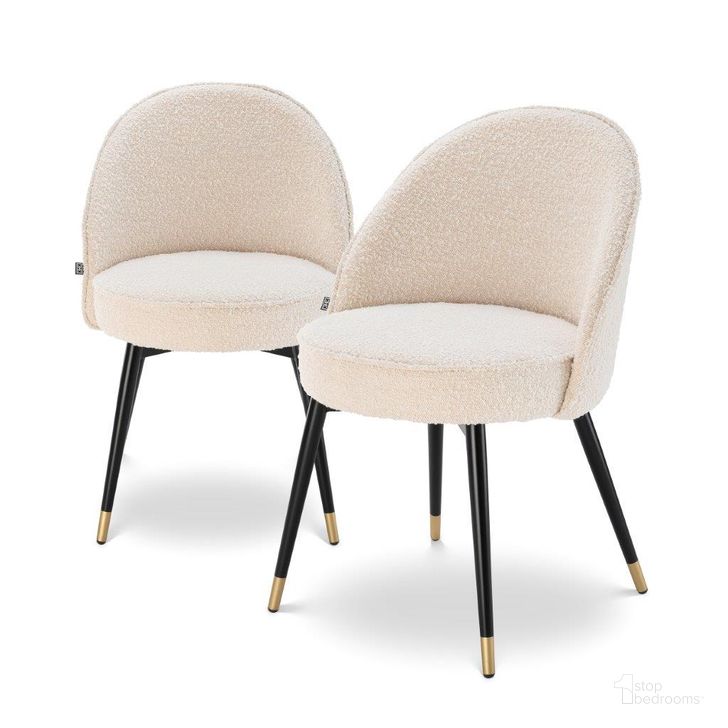 The appearance of Dining Chair Cooper Boucle Cream Set Of 2 designed by Eichholtz in the modern / contemporary interior design. This cream piece of furniture  was selected by 1StopBedrooms from  to add a touch of cosiness and style into your home. Sku: A113988. Product Type: Dining Chair. Material: Brass. Image1