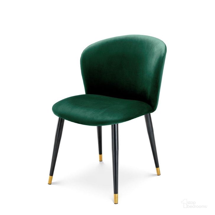 The appearance of Dining Chair Volante Roche Dark Green Velvet designed by Eichholtz in the modern / contemporary interior design. This green piece of furniture  was selected by 1StopBedrooms from Volante Collection to add a touch of cosiness and style into your home. Sku: A113036;A113117. Product Type: Dining Chair. Image1