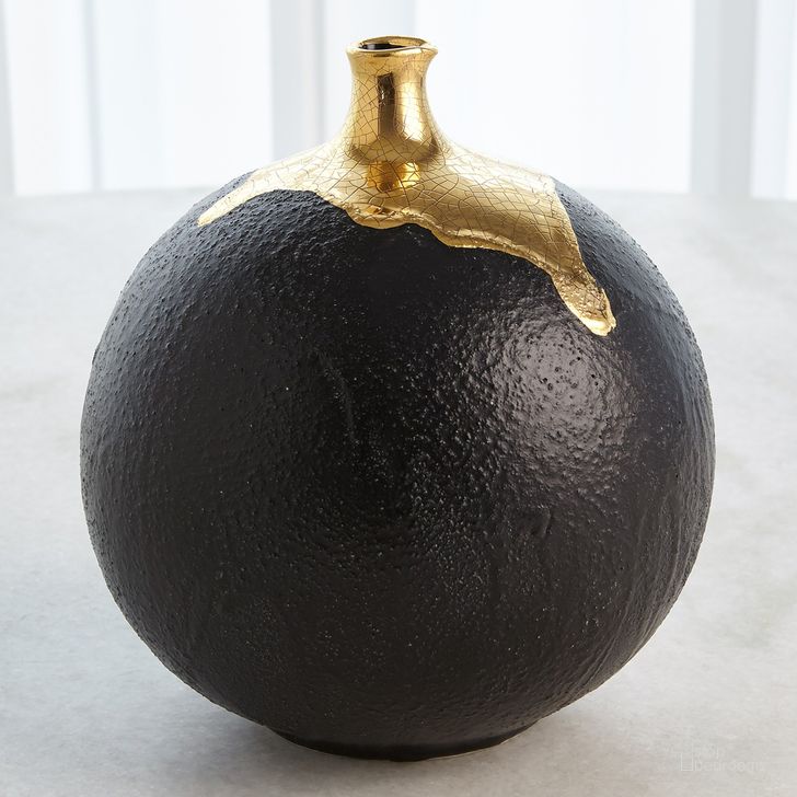 The appearance of Dipped Golden Crackle And Black Sphere Large Vase In Black designed by Global Views in the modern / contemporary interior design. This black piece of furniture  was selected by 1StopBedrooms from Dipped Collection to add a touch of cosiness and style into your home. Sku: 3.31642. Material: Ceramic. Product Type: Vase. Image1