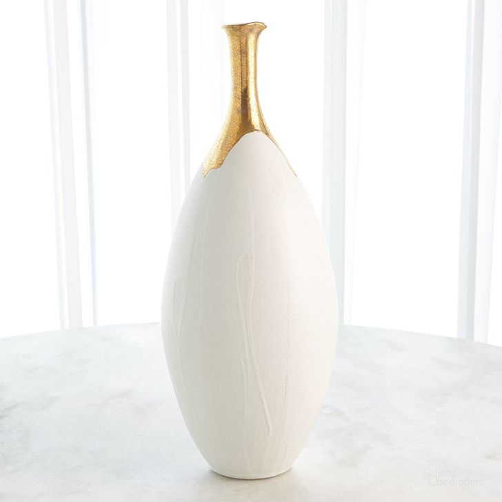 The appearance of Dipped Golden Crackle And White Slender Large Vase In Gold designed by Global Views in the modern / contemporary interior design. This gold piece of furniture  was selected by 1StopBedrooms from Dipped Collection to add a touch of cosiness and style into your home. Sku: 3.31632. Material: Ceramic. Product Type: Vase. Image1
