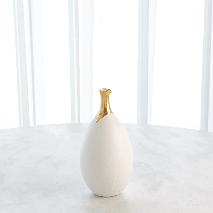 The appearance of Dipped Golden Crackle And White Slender Small Vase In Gold designed by Global Views in the modern / contemporary interior design. This gold piece of furniture  was selected by 1StopBedrooms from Dipped Collection to add a touch of cosiness and style into your home. Sku: 3.31633. Material: Ceramic. Product Type: Vase. Image1