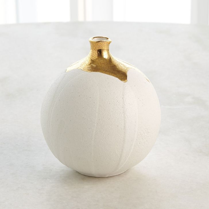 The appearance of Dipped Golden Crackle And White Sphere Small Vase designed by Global Views in the modern / contemporary interior design. This gold piece of furniture  was selected by 1StopBedrooms from Dipped Collection to add a touch of cosiness and style into your home. Sku: 3.31637. Material: Ceramic. Product Type: Vase. Image1
