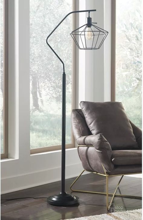 The appearance of Dylann Black Floor Lamp designed by Atelier Home in the modern / contemporary interior design. This black piece of furniture  was selected by 1StopBedrooms from Dylann Collection to add a touch of cosiness and style into your home. Sku: L207181. Material: Metal. Product Type: Floor Lamp. Image1