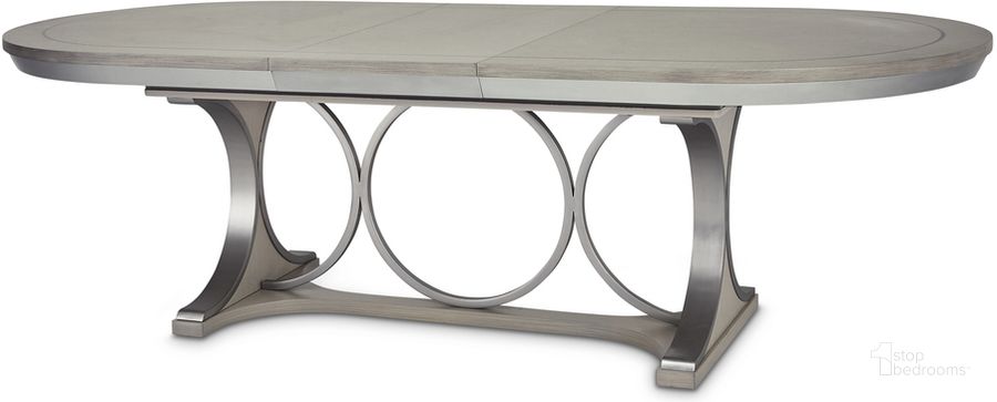 The appearance of Eclipse Oval Dining Table In Moonlight designed by AICO in the modern / contemporary interior design. This moonlight piece of furniture  was selected by 1StopBedrooms from Eclipse Collection to add a touch of cosiness and style into your home. Sku: KI-ECLP000B-135;KI-ECLP000T-135. Table Base Style: Trestle. Table Top Shape: Oval. Product Type: Dining Table. Material: Rubberwood. Size: 100". Image1