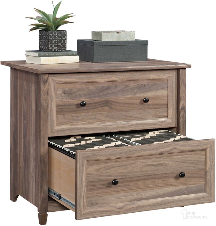 The appearance of Edge Water Lateral File In Washed Walnut designed by Sauder in the country / farmhouse interior design. This washed walnut piece of furniture  was selected by 1StopBedrooms from Edge Water Collection to add a touch of cosiness and style into your home. Sku: 431584. Product Type: File Cabinet. Material: Engineered Wood. Image1