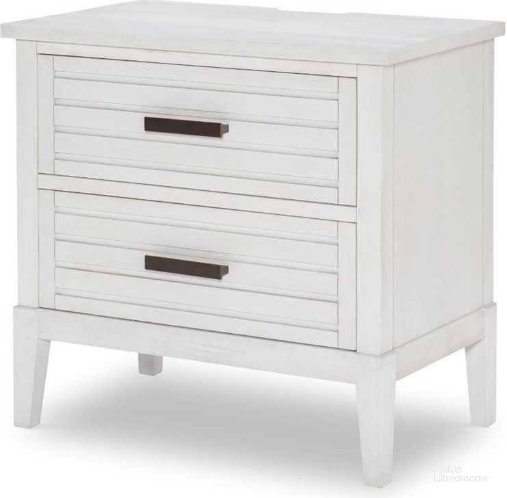 The appearance of Edgewater Sand Dollar Two Drawer Nightstand designed by Legacy Classic in the coastal interior design. This white piece of furniture  was selected by 1StopBedrooms from Edgewater Collection to add a touch of cosiness and style into your home. Sku: 1313-3100. Product Type: Nightstand. Material: Wood Veneer. Image1