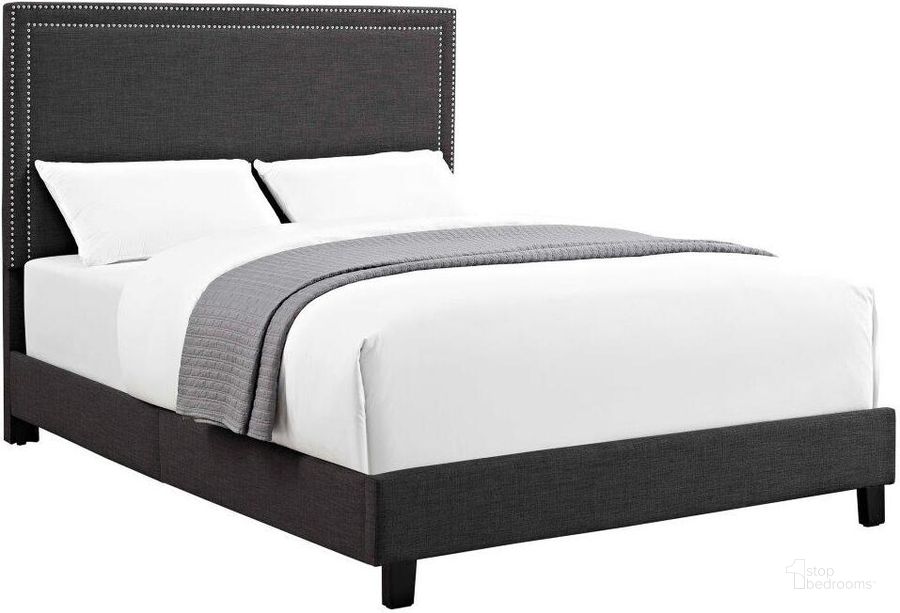 The appearance of Emery Charcoal Queen Upholstered Platform Bed designed by Picket House in the transitional interior design. This gray piece of furniture  was selected by 1StopBedrooms from Emery Collection to add a touch of cosiness and style into your home. Sku: UMY090QB. Bed Type: Platform Bed. Material: Wood. Product Type: Platform Bed. Bed Size: Queen. Image1
