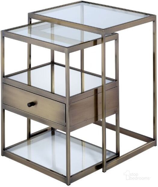 The appearance of Enca Antique Brass and Clear Glass Nesting Tables designed by ACME in the modern / contemporary interior design. This brown piece of furniture  was selected by 1StopBedrooms from Enca Collection to add a touch of cosiness and style into your home. Sku: 84470. Material: Glass. Product Type: Nesting Table. Image1