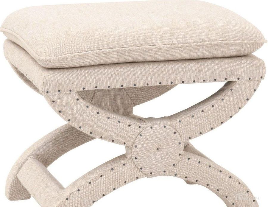 The appearance of Essentials Linen Gaston Ottoman designed by Essentials For Living in the transitional interior design. This beige piece of furniture  was selected by 1StopBedrooms from Essentials Collection to add a touch of cosiness and style into your home. Sku: 6437UP.BIS-BT. Product Type: Ottoman. Material: Plywood. Image1