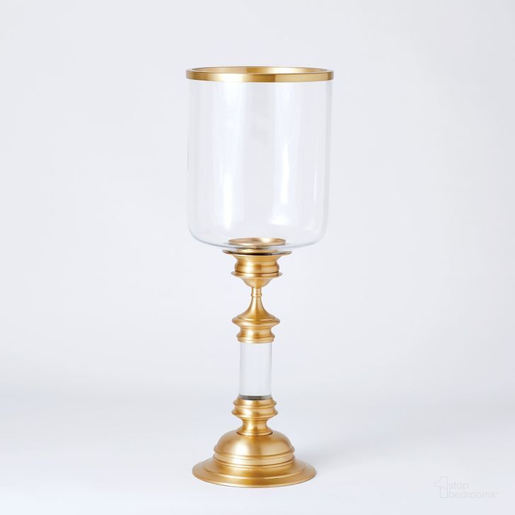 The appearance of Estate Tall Hurricane In Antique Brass designed by Global Views in the modern / contemporary interior design. This brass piece of furniture  was selected by 1StopBedrooms from Estate Collection to add a touch of cosiness and style into your home. Sku: 9.90778. Material: Glass. Product Type: Decorative Accessory. Image1