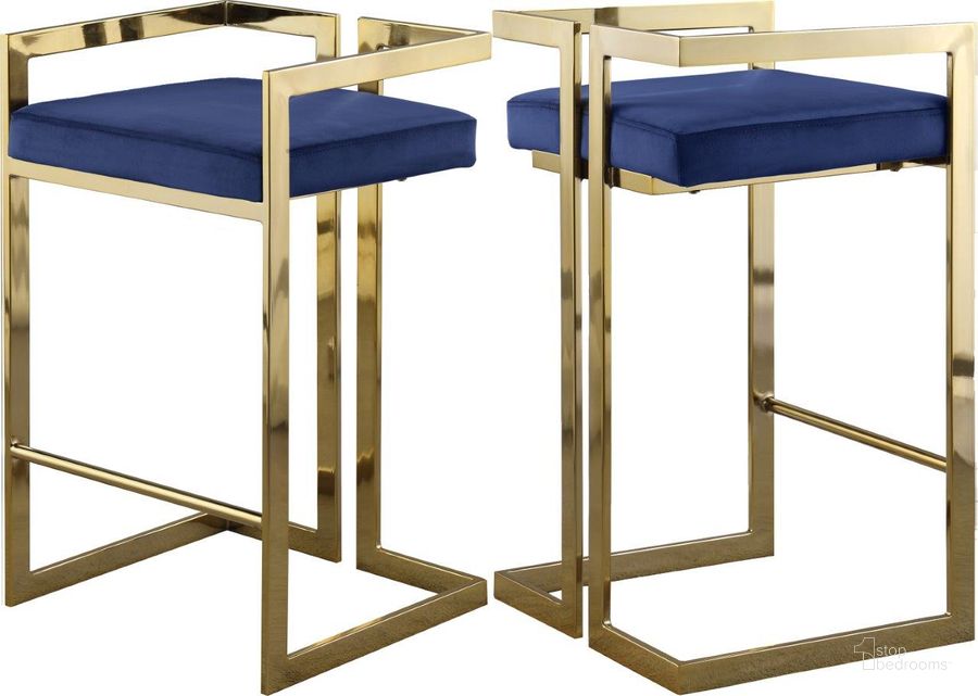 The appearance of Ezra Navy Velvet Stool 912Navy-C Set of 2 designed by Meridian in the modern / contemporary interior design. This navy velvet piece of furniture  was selected by 1StopBedrooms from Ezra Collection to add a touch of cosiness and style into your home. Sku: 912Navy-C. Product Type: Barstool. Material: Velvet. Image1
