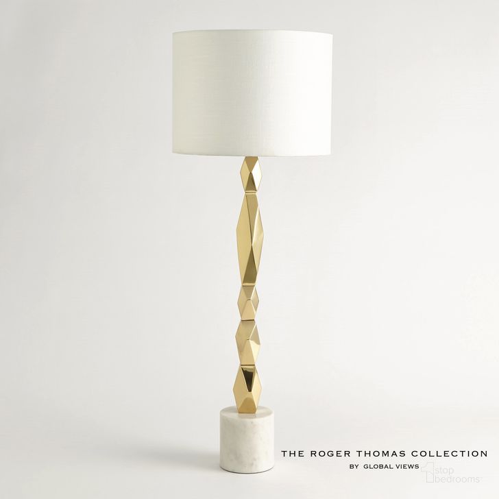 The appearance of Facet Block Tall Table Lamp In Brass designed by Global Views in the modern / contemporary interior design. This gold piece of furniture  was selected by 1StopBedrooms from Facet Collection to add a touch of cosiness and style into your home. Sku: RT9.90021. Product Type: Table Lamp. Material: Brass. Image1