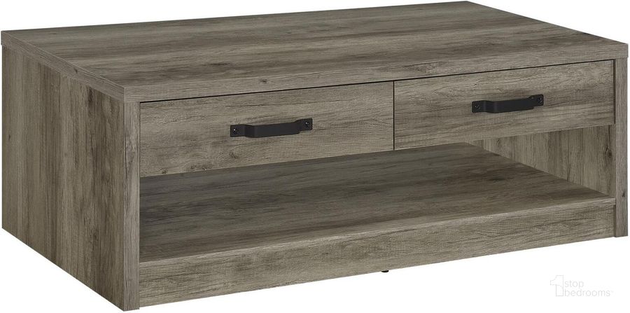 The appearance of Felix 2-Drawer Rectangular Engineered Wood Coffee Table In Grey Driftwood designed by Coaster in the rustic / southwestern interior design. This grey driftwood piece of furniture  was selected by 1StopBedrooms from Felix Collection to add a touch of cosiness and style into your home. Sku: 707728. Material: Wood. Product Type: Coffee Table. Image1