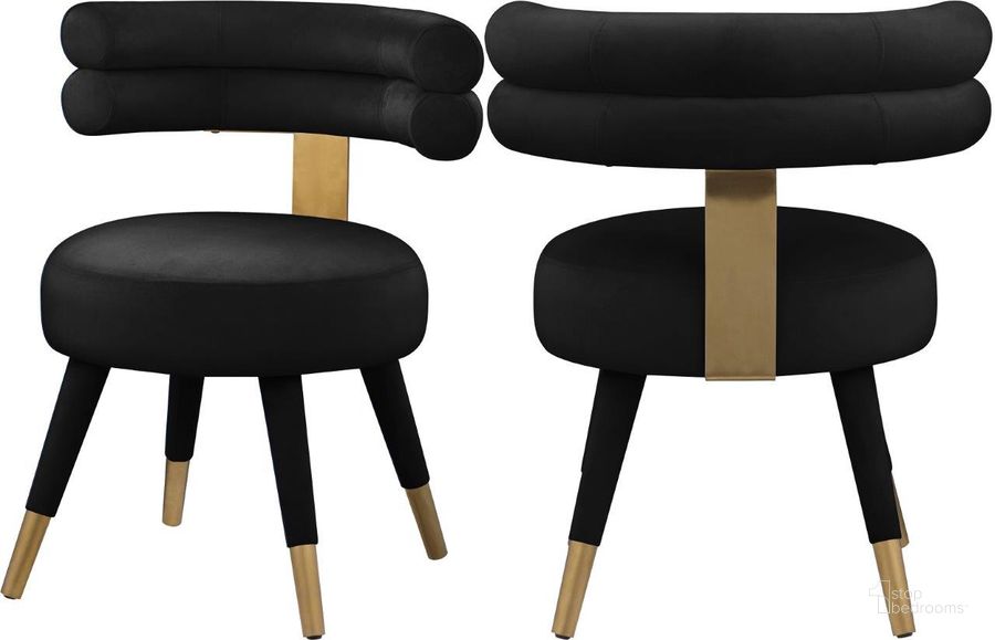 The appearance of Fitzroy Black Velvet Dining Chair Set of 2 designed by Meridian in the modern / contemporary interior design. This black velvet piece of furniture  was selected by 1StopBedrooms from Fitzroy Collection to add a touch of cosiness and style into your home. Sku: 747Black-C. Product Type: Dining Chair. Material: Velvet. Image1