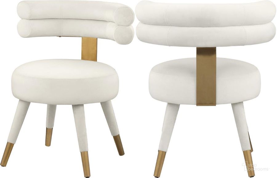 The appearance of Fitzroy Cream Velvet Dining Chair Set of 2 designed by Meridian in the modern / contemporary interior design. This cream velvet piece of furniture  was selected by 1StopBedrooms from Fitzroy Collection to add a touch of cosiness and style into your home. Sku: 747Cream-C. Product Type: Dining Chair. Material: Velvet. Image1