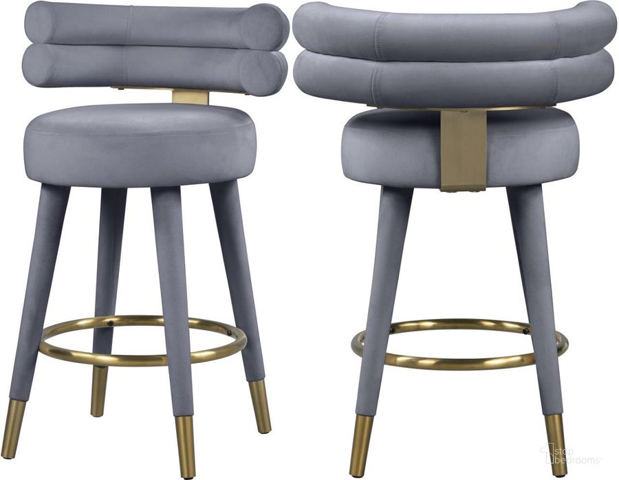 The appearance of Fitzroy Grey Velvet Counter Stool Set of 2 designed by Meridian in the modern / contemporary interior design. This grey velvet piece of furniture  was selected by 1StopBedrooms from Fitzroy Collection to add a touch of cosiness and style into your home. Sku: 798Grey-C. Product Type: Barstool. Material: Iron. Image1