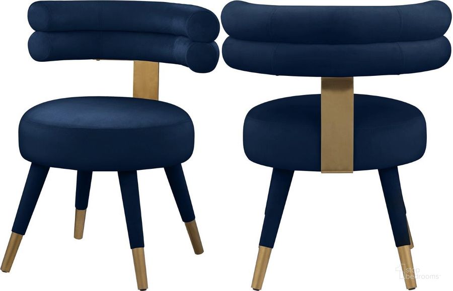 The appearance of Fitzroy Navy Velvet Dining Chair Set of 2 designed by Meridian in the modern / contemporary interior design. This navy velvet piece of furniture  was selected by 1StopBedrooms from Fitzroy Collection to add a touch of cosiness and style into your home. Sku: 747Navy-C. Product Type: Dining Chair. Material: Velvet. Image1