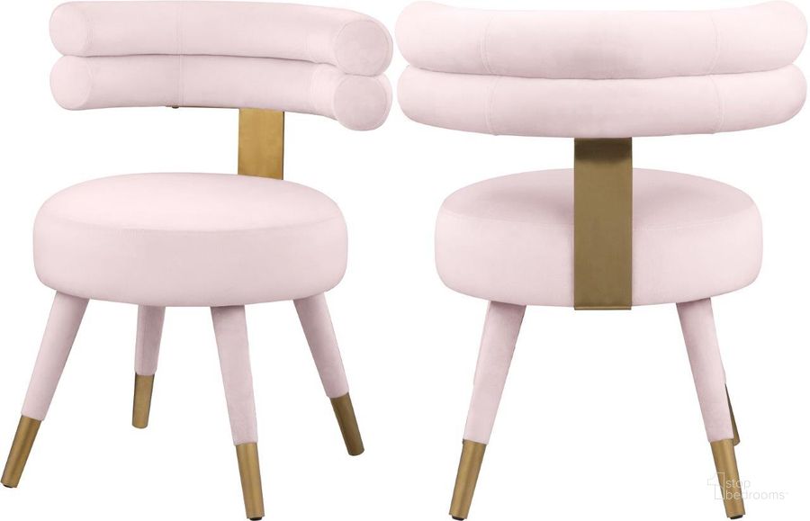 The appearance of Fitzroy Pink Velvet Dining Chair Set of 2 designed by Meridian in the modern / contemporary interior design. This pink velvet piece of furniture  was selected by 1StopBedrooms from Fitzroy Collection to add a touch of cosiness and style into your home. Sku: 747Pink-C. Product Type: Dining Chair. Material: Velvet. Image1