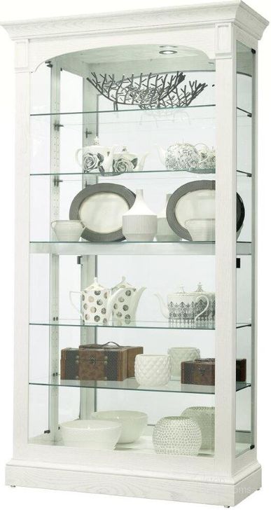 The appearance of Flora Ii Curio In Ivory designed by Howard Miller in the modern / contemporary interior design. This cream piece of furniture  was selected by 1StopBedrooms from Flora Collection to add a touch of cosiness and style into your home. Sku: 680726. Product Type: Curio Cabinet.