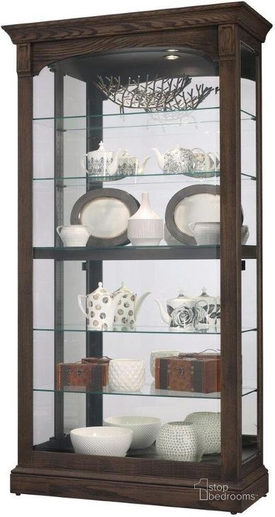 The appearance of Flora Iii Curio In Oak designed by Howard Miller in the modern / contemporary interior design. This gray piece of furniture  was selected by 1StopBedrooms from Flora Collection to add a touch of cosiness and style into your home. Sku: 680727. Product Type: Curio Cabinet.