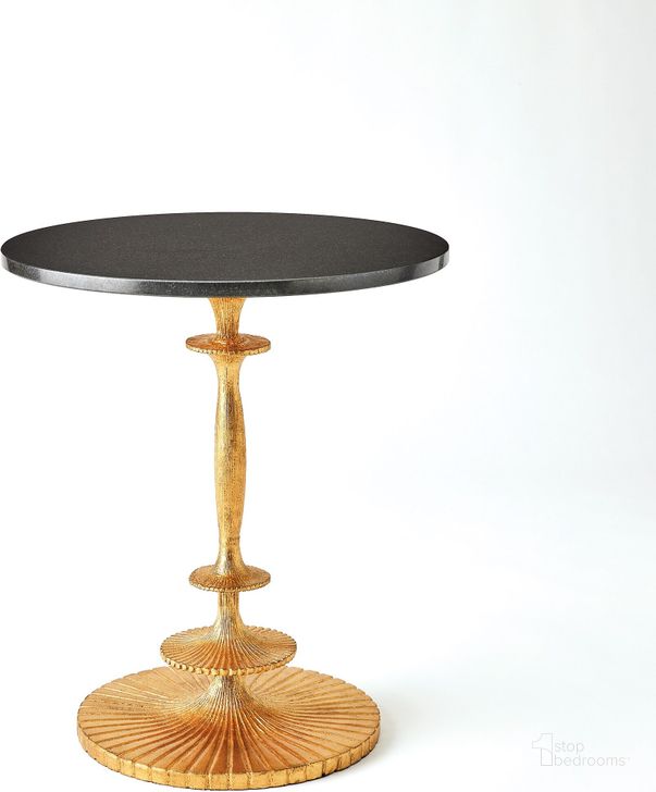The appearance of Fluted Side Table In Gold Leaf designed by Global Views in the modern / contemporary interior design. This black piece of furniture  was selected by 1StopBedrooms from Fluted Collection to add a touch of cosiness and style into your home. Sku: 8.83062. Product Type: Side Table. Material: Iron. Image1