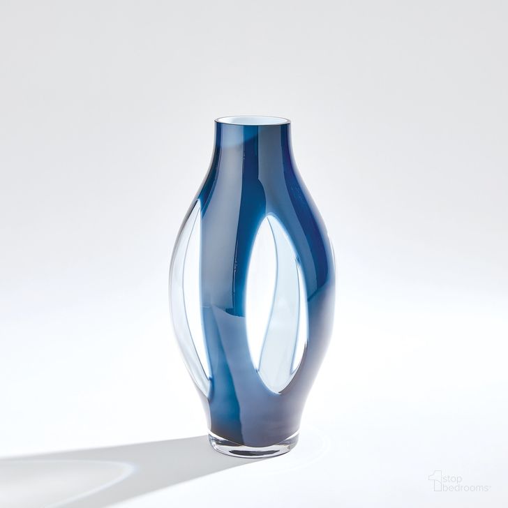 The appearance of Fly Through Medium Vase In Night Blue designed by Global Views in the modern / contemporary interior design. This blue piece of furniture  was selected by 1StopBedrooms from Fly Collection to add a touch of cosiness and style into your home. Sku: 7.60218. Material: Glass. Product Type: Vase. Image1