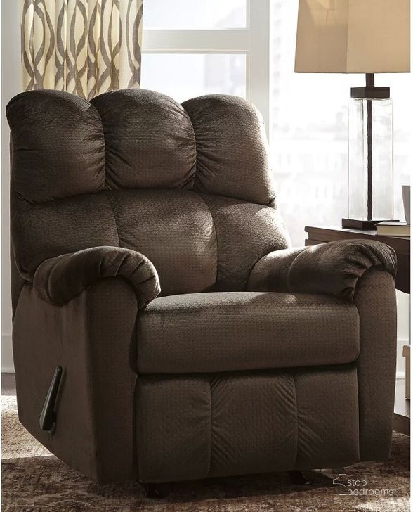 The appearance of Foxfield Chocolate Rocker Recliner designed by Signature Design by Ashley in the modern / contemporary interior design. This chocolate piece of furniture  was selected by 1StopBedrooms from Foxfield Collection to add a touch of cosiness and style into your home. Sku: 1040225. Material: Fabric. Product Type: Rocker Recliner. Image1