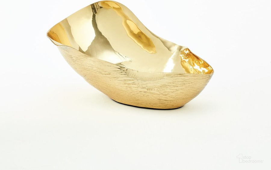 The appearance of Free Form Small Bowl In Brass designed by Global Views in the modern / contemporary interior design. This brass piece of furniture  was selected by 1StopBedrooms from Free Collection to add a touch of cosiness and style into your home. Sku: 9.93831. Product Type: Bowl. Material: Brass. Image1