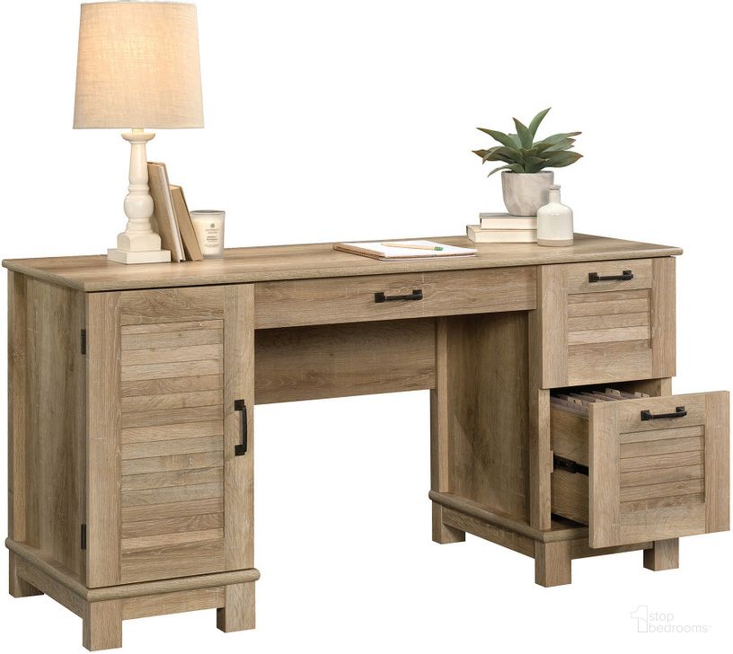 The appearance of Garden Villa Desk In Orchard Oak designed by Sauder in the country / farmhouse interior design. This orchard oak piece of furniture  was selected by 1StopBedrooms from Garden Villa Collection to add a touch of cosiness and style into your home. Sku: 424108. Product Type: Desk. Material: Engineered Wood. Image1