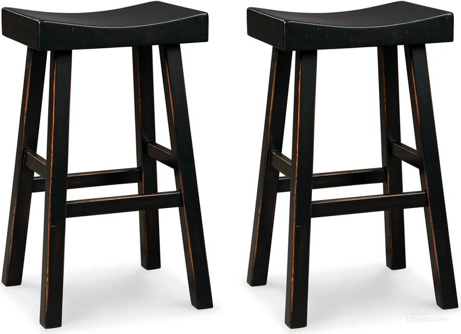 The appearance of Glosco Black Pub Height Bar Stool Set of 2 designed by Signature Design by Ashley in the transitional interior design. This black piece of furniture  was selected by 1StopBedrooms from Glosco Collection to add a touch of cosiness and style into your home. Sku: D548-530. Material: Wood. Product Type: Barstool. Image1