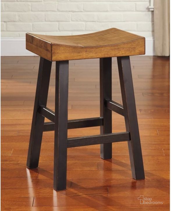 The appearance of Glosco Two-Tone Backless Stool Set of 2 designed by Signature Design by Ashley in the transitional interior design. This medium brown/dark brown piece of furniture  was selected by 1StopBedrooms from Glosco Collection to add a touch of cosiness and style into your home. Sku: D548-024. Material: Wood. Product Type: Barstool. Image1