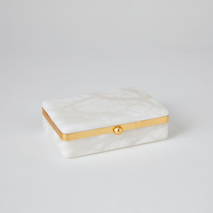 The appearance of Gold Band Swivel Alabaster Large Box In Gold designed by Global Views in the modern / contemporary interior design. This gold piece of furniture  was selected by 1StopBedrooms from Gold Collection to add a touch of cosiness and style into your home. Sku: 3.3175. Product Type: Box. Material: Alabaster. Image1