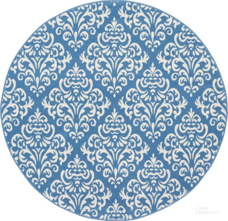 The appearance of Grafix Blue 5 Round Area Rug designed by Nourison in the transitional interior design. This blue piece of furniture  was selected by 1StopBedrooms from Grafix Collection to add a touch of cosiness and style into your home. Sku: 99446459145. Material: Polypropylene. Product Type: Area Rugs. Image1